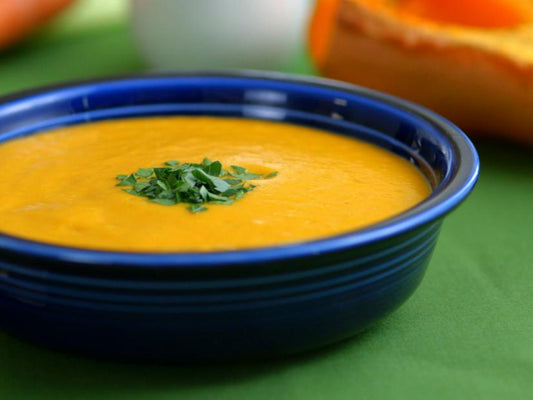 Creamy roasted butternut squash soup in a bowl
